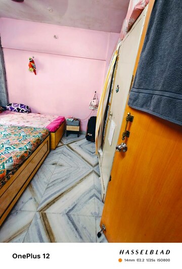 Bedroom in 2 BHK Apartment at Lalji Complex, Kandivali West – for Sale