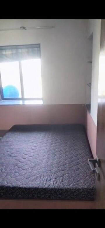 Bedroom in 2 BHK Apartment at Milap CHS, Andheri West – for Rent