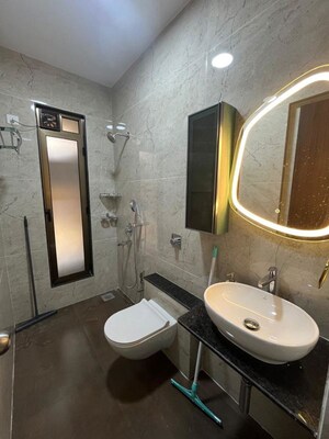 Bathroom in 3 BHK Apartment at Kamal Apartment Teen Hath Naka, Louis Wadi – for Rent