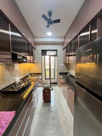 Kitchen in 3 BHK Apartment at Kamal Apartment Teen Hath Naka, Louis Wadi – for Rent