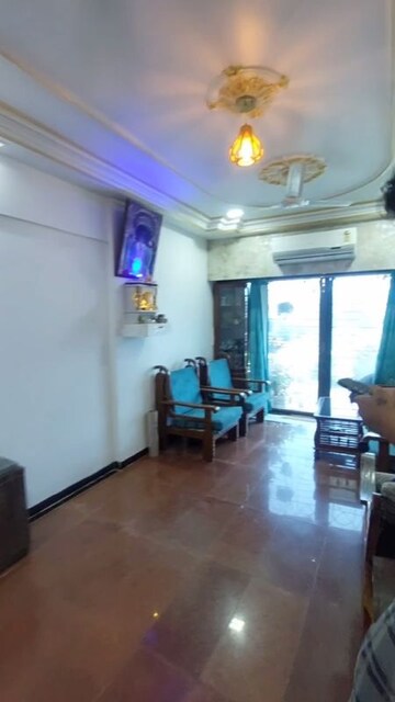 Living Room in 1.5 BHK Apartment at Golden Palace CHS, Kandivali East – for Sale