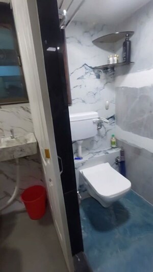 Bathroom in 1.5 BHK Apartment at Golden Palace CHS, Kandivali East – for Sale
