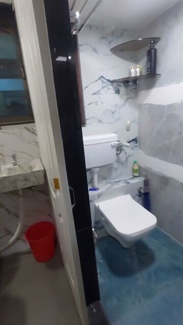 Bathroom in 1.5 BHK Apartment at Golden Palace CHS, Kandivali East – for Sale