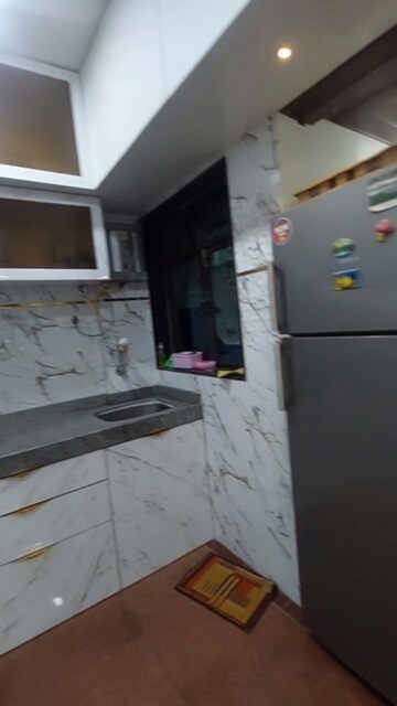 Kitchen in 1.5 BHK Apartment at Golden Palace CHS, Kandivali East – for Sale