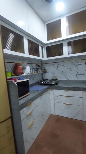 Kitchen in 1.5 BHK Apartment at Golden Palace CHS, Kandivali East – for Sale
