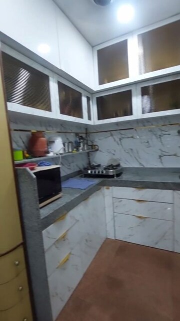 Kitchen in 1.5 BHK Apartment at Golden Palace CHS, Kandivali East – for Sale