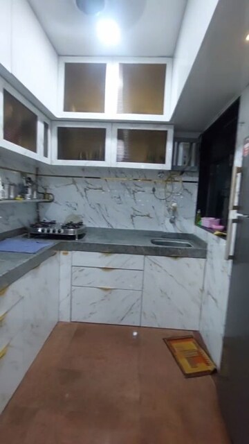 Kitchen in 1.5 BHK Apartment at Golden Palace CHS, Kandivali East – for Sale