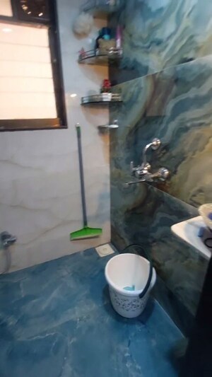 Bathroom in 1.5 BHK Apartment at Golden Palace CHS, Kandivali East – for Sale