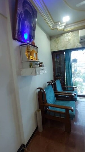Living Room in 1.5 BHK Apartment at Golden Palace CHS, Kandivali East – for Sale