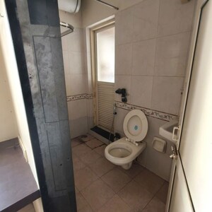 Bathroom in 1 BHK Apartment at K Raheja Palm Spring, Malad West – for Rent
