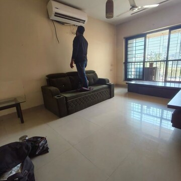 Living Room in 1 BHK Apartment at K Raheja Palm Spring, Malad West – for Rent