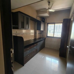 Kitchen in 1 BHK Apartment at K Raheja Palm Spring, Malad West – for Rent