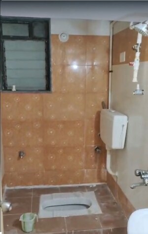 Bathroom in 3 BHK Apartment at Balaji Trinity Heights, Haware City – for Sale