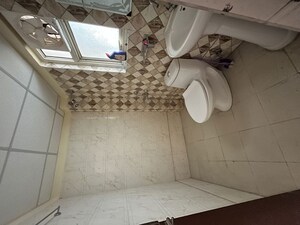 Bathroom in 2 BHK Apartment at Wave Dream Homes, Wave City – for Rent