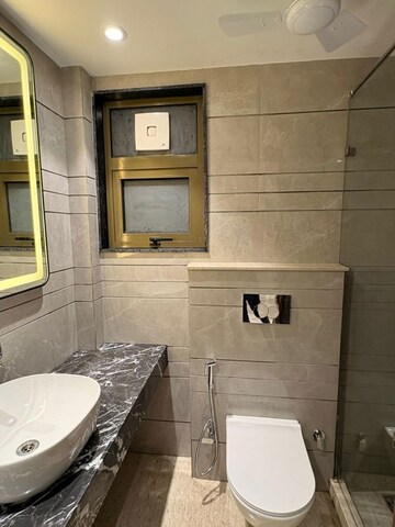 Bathroom in 3 BHK Builder Floor at Green Park Extension – for Sale