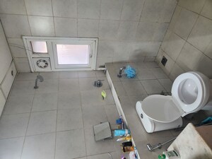 Bathroom in 2 BHK Apartment at Bhartiya Nikoo Homes, Thanisandra Main Road – for Rent