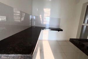 Kitchen in 1 BHK Apartment at Godrej Sky Greens, Kharadi – for Rent