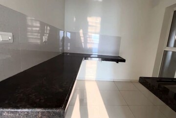 Kitchen in 1 BHK Apartment at Godrej Sky Greens, Kharadi – for Rent