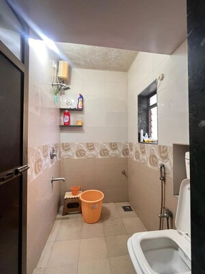 Bathroom in 2 BHK Apartment at Raj Ratna Park CHS, Brahmand – for Rent