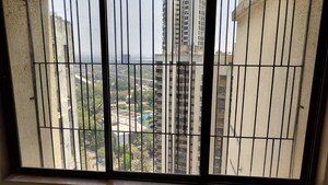 Building Lobby in 2 BHK Apartment at Runwal Garden City, Balkum Pada – for Rent