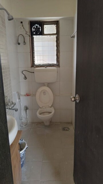 Bathroom in 2 BHK Apartment at Runwal Garden City, Balkum Pada – for Rent