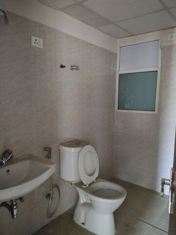Bathroom in 3 BHK Apartment at Amrapali Golf Homes, Sector 4 Greater Noida – for Sale