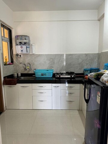 Kitchen in 2 BHK Apartment at Kohinoor Zen Estate, Kharadi – for Rent