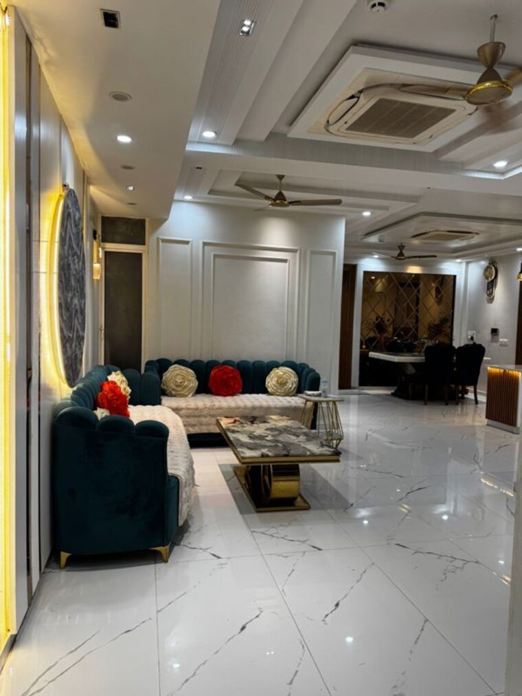 Living Room, land-craft-golf-links-apartment-phase-1 4 Bedroom 2870 Sq.Ft. Apartment In Pandav Nagar Ghaziabad 10097416