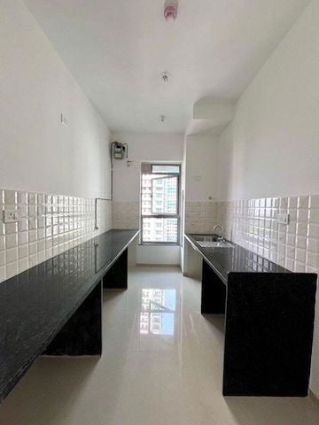 Building Lobby in 2 BHK Apartment at Kalpataru Immensa, Kolshet Road – for Rent