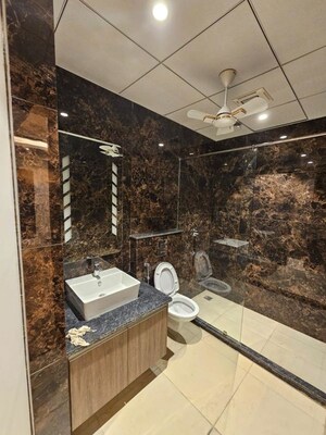 Washroom in 3 BHK Apartment at Ansal API Esencia, Sector 67 – for Sale