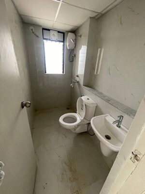 Bathroom in 1 BHK Apartment at Runwal Gardens, Dombivli East – for Sale