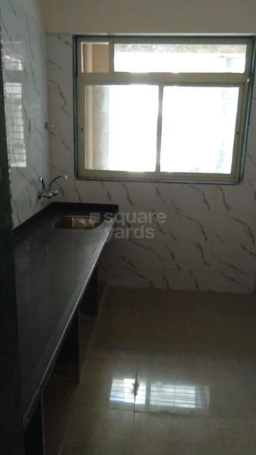 Kitchen in 2 BHK Builder Floor at Badlapur East – for Sale