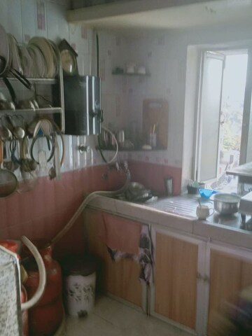 Kitchen in 1 BHK Apartment at Hanjar Nagar CHS, Andheri East – for Sale