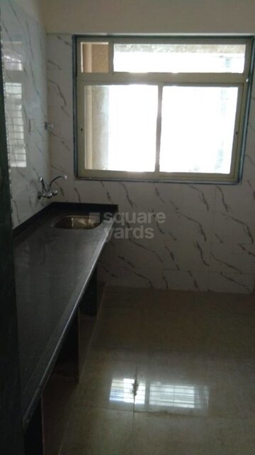 Kitchen in 2 BHK Builder Floor at Badlapur East – for Sale