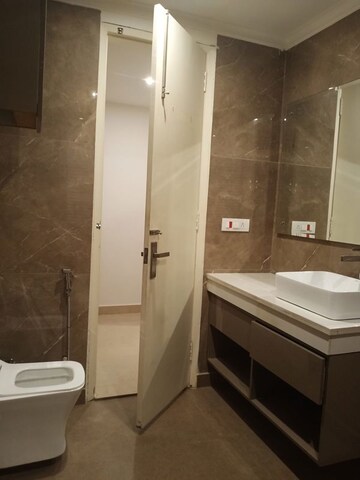 Bathroom in 3 BHK Builder Floor at Amolik Aster Woods, Sector 98 – for Sale