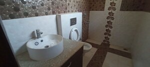 Bathroom in 3 BHK Builder Floor at Amolik Aster Woods, Sector 98 – for Sale