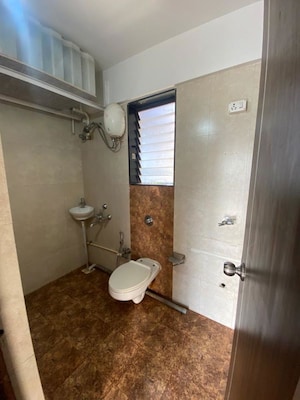 Bathroom in 3 BHK Apartment at Sudarshan Sky Garden, Ghodbunder Road – for Rent