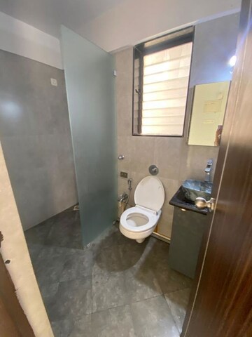 Bathroom in 3 BHK Apartment at Sudarshan Sky Garden, Ghodbunder Road – for Rent