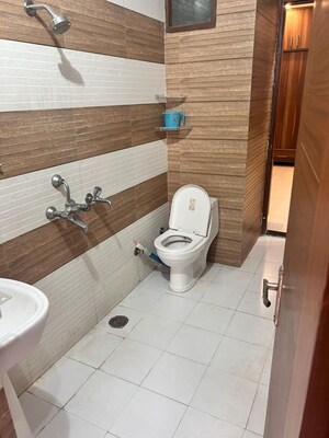 Bathroom in 3 BHK Apartment at Singla South City, Lohgarh – for Rent