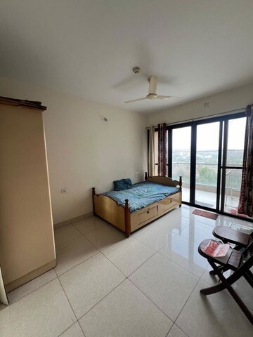 Living Room in 2 BHK Apartment at Magarpatta Nanded City Sargam, Sinhagad – for Rent