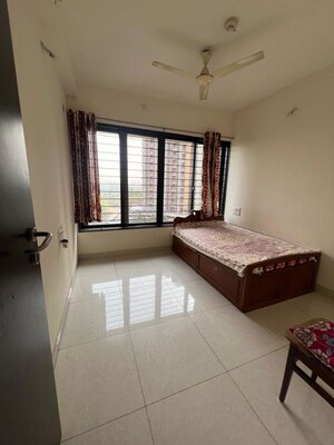 Bedroom in 2 BHK Apartment at Magarpatta Nanded City Sargam, Sinhagad – for Rent