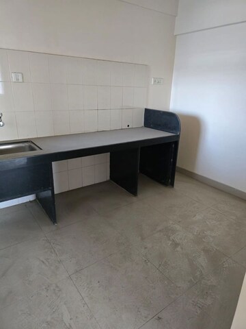 Kitchen in 2 BHK Apartment at Dharmavat Sunder Samruddhi, Dhayari – for Sale