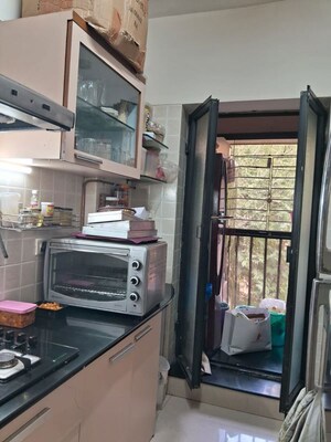 Kitchen in 3 BHK Apartment at K Raheja Gardens, Wanowrie – for Rent
