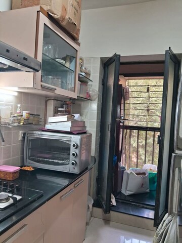 Kitchen in 3 BHK Apartment at K Raheja Gardens, Wanowrie – for Rent