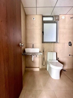 Bathroom in 3 BHK Apartment at Kalpataru Immensa, Kolshet Road – for Rent
