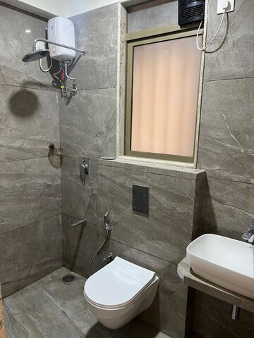 Bathroom in 3 BHK Apartment at Mangalkripa Apartment, Goregaon West – for Rent