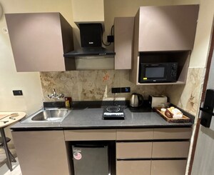 Kitchen in Studio Apartment at PKS Town Central, Sector 16b Greater Noida – for Rent