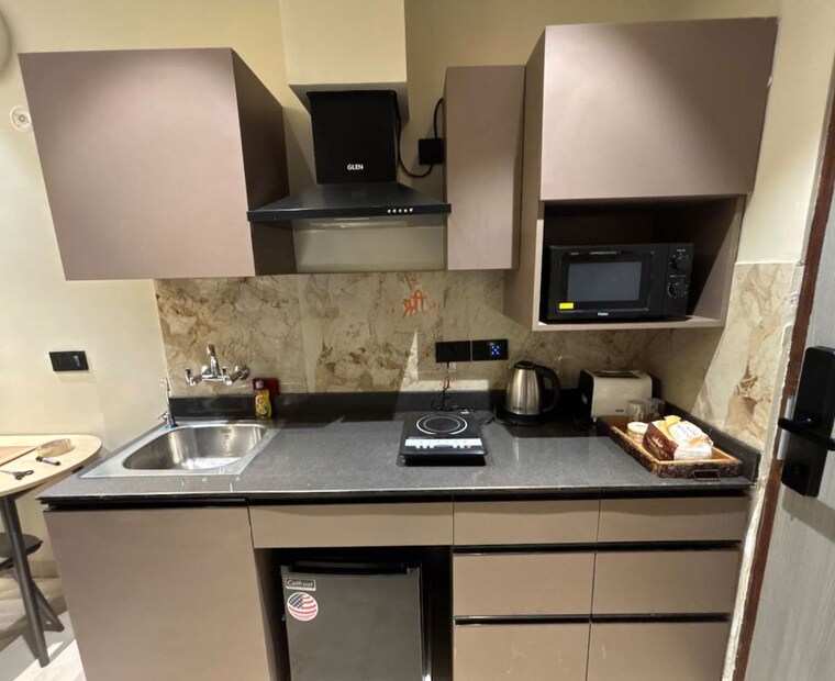 Kitchen, pks-town-central Studio 400 Sq.Ft. Apartment In Sector 16b Greater Noida Greater Noida 10063819