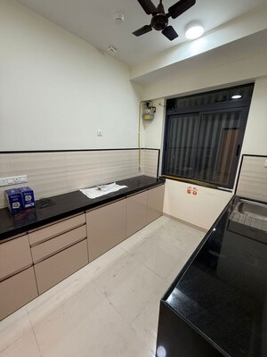 Kitchen in 2 BHK Apartment at Dynamix Divum, Malad East – for Rent