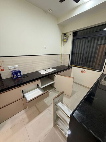 Kitchen in 2 BHK Apartment at Dynamix Divum, Malad East – for Rent